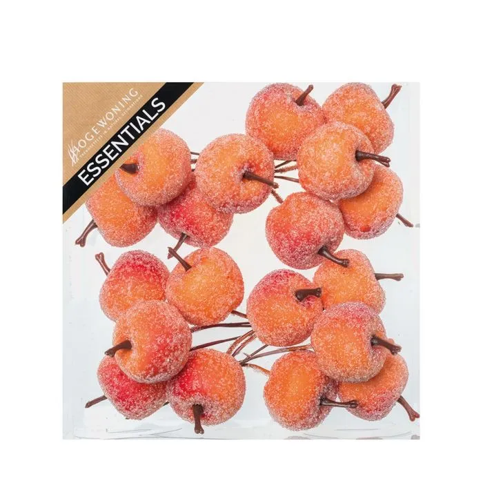 Frostade orangea äpplen på tråd