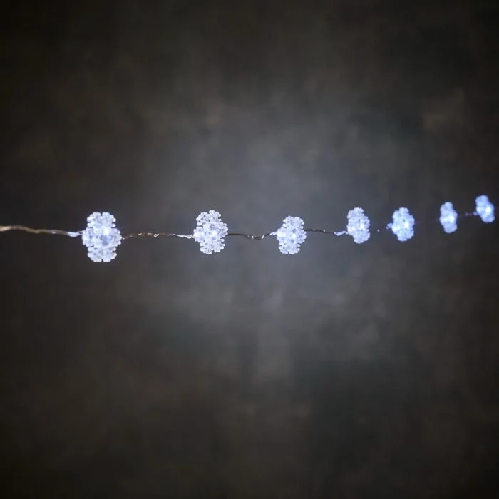Ljusslinga med 20 självlysande snöflingor