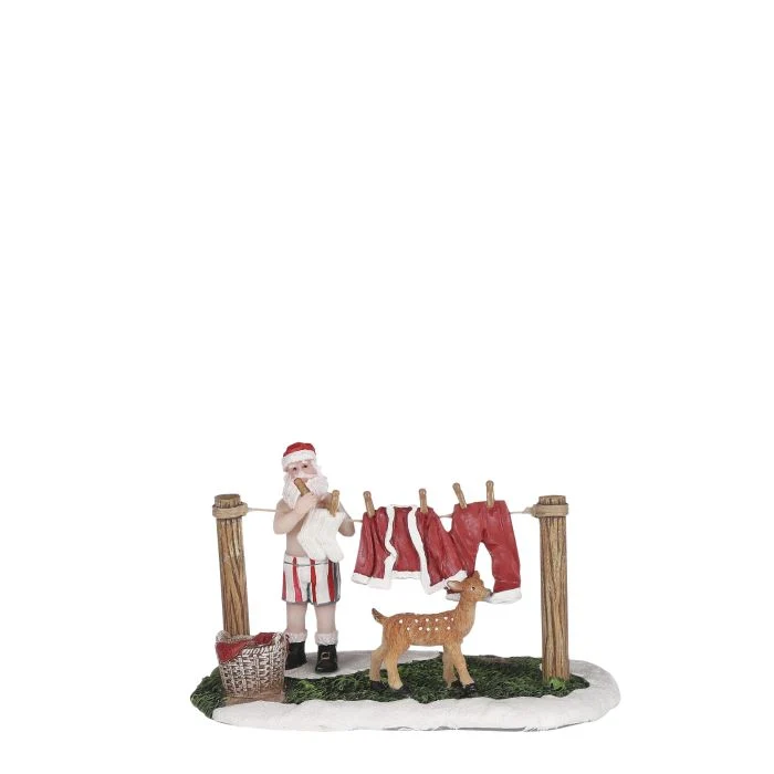 Luville Jultomte vid klädstrecket